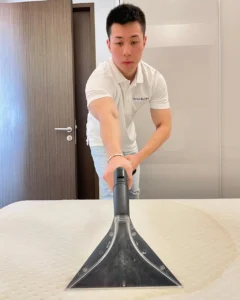 Three Butlers Professional Cleaning Specialist Performing Deep Mattress Cleaning in SIngapore